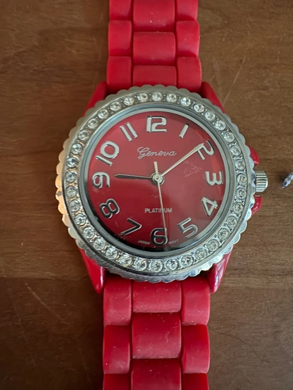 Geneva Platinum Red Dial Crystal Bezel Red Rubber Band Watch - needs Battery